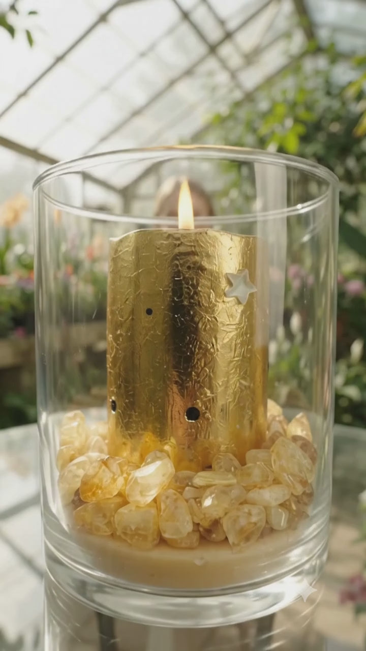 Load video: LALOVE Wealth Candle in a warm, peaceful setting with citrine crystals and a lit candle.